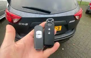 Mazda sleutel bijmaken reparatie batterij Nijmegen mazda sleutel bij laten maken, mazda sleutel met aftandsbediening